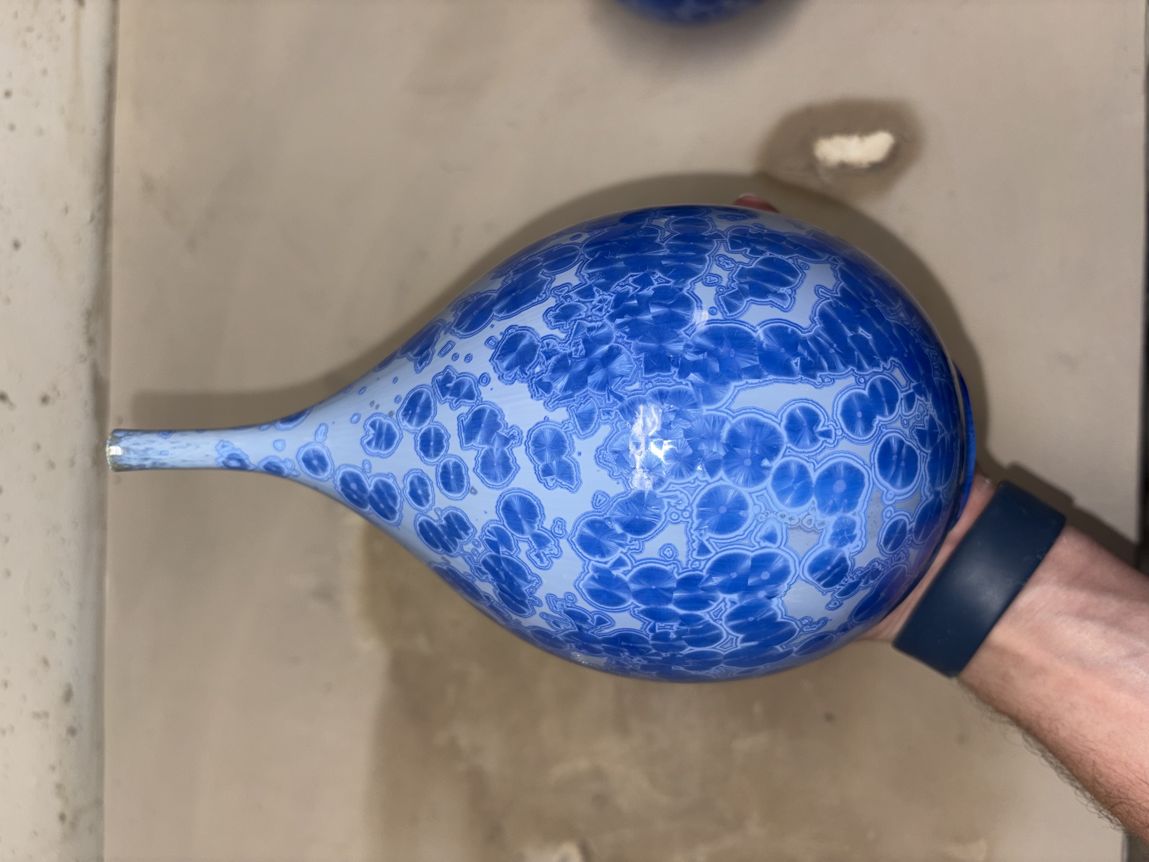 Handmade teardrop-shaped ceramic vase with dense cobalt blue zinc silicate crystalline glaze by Brandon Franks